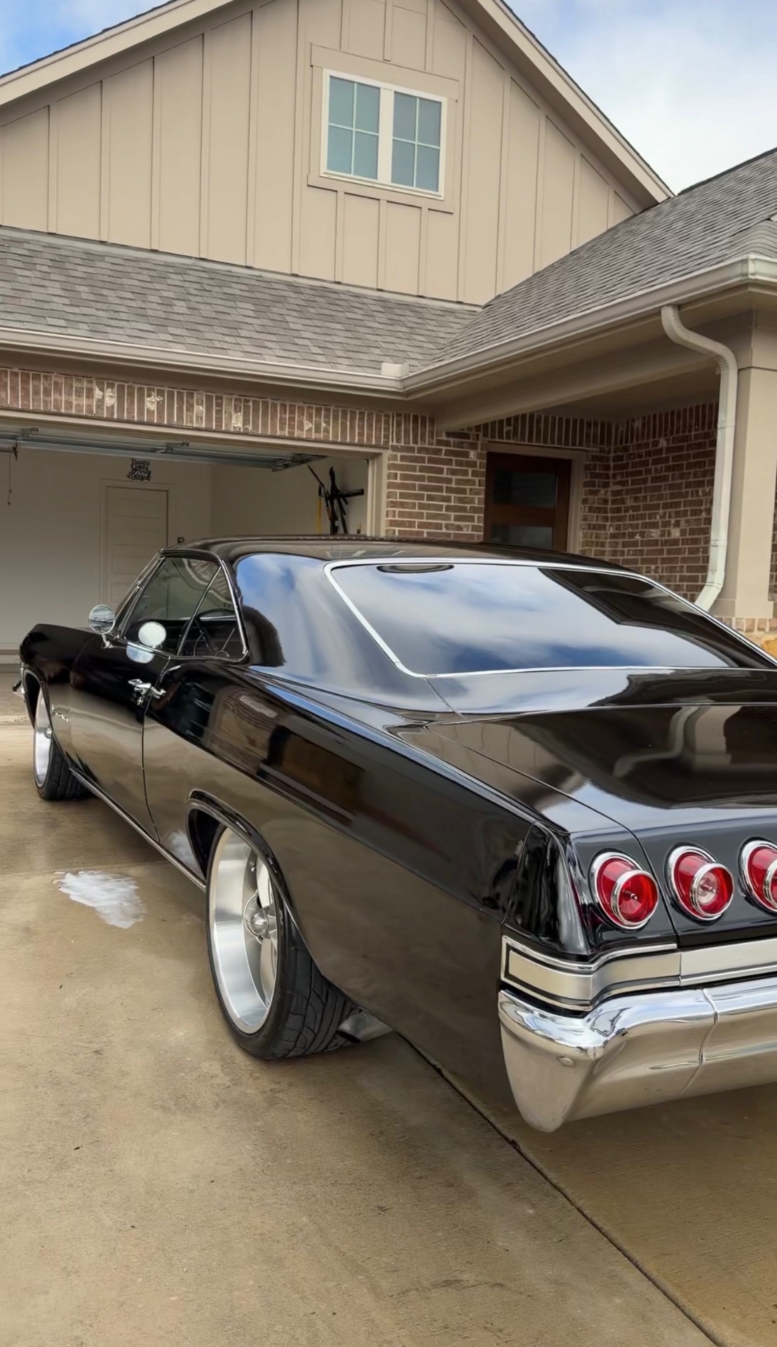 Chevrolet Impala — classic black rear mirror finish